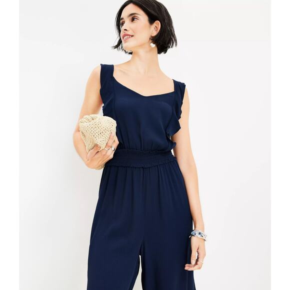 LOFT Pants - Ann Taylor LOFT Blue Sleeveless Ruffle Smocked Wide Leg Romper Jumpsuit Size S